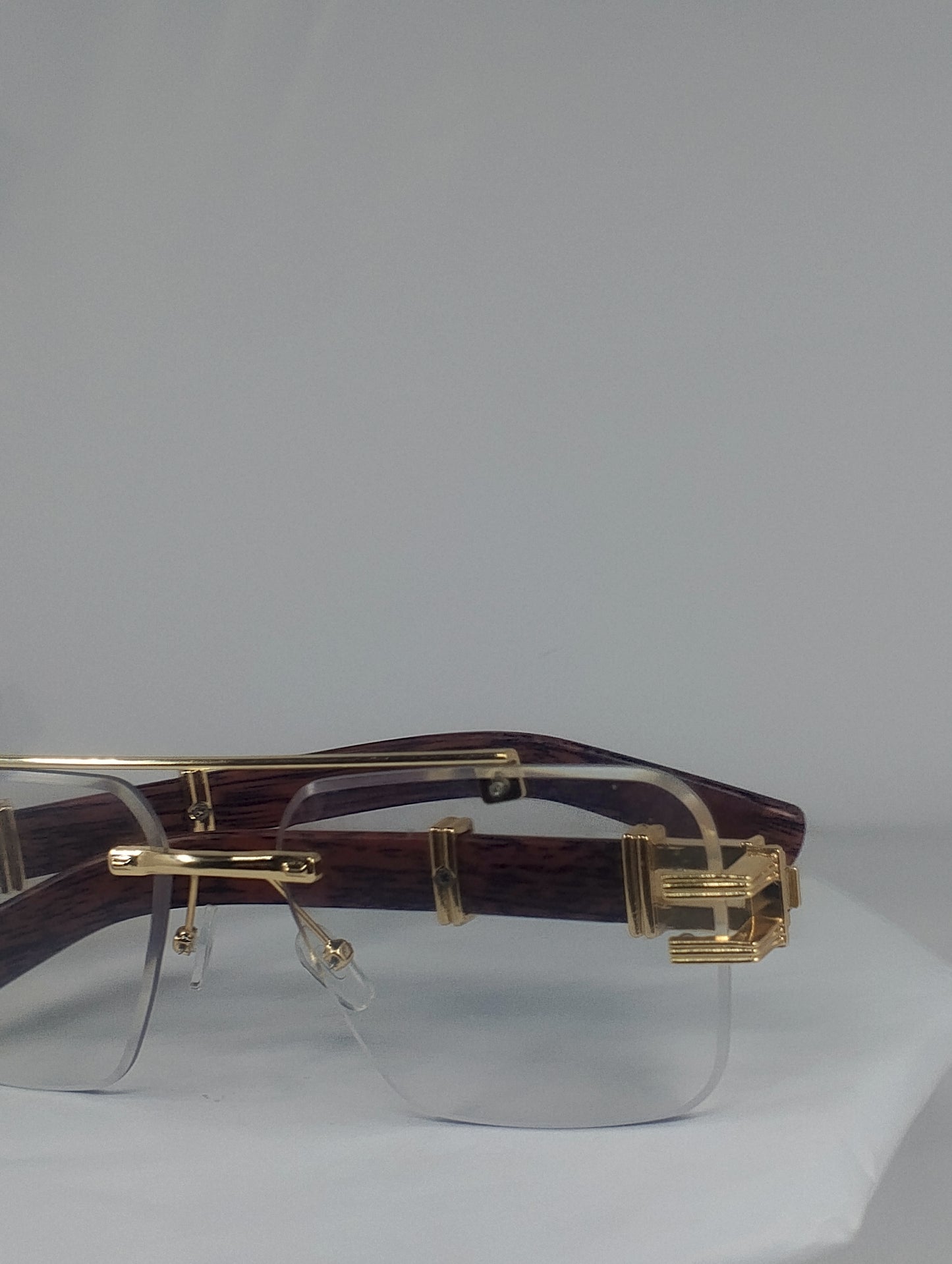 Luxury Rimless Blue-Light Blocking Eyeglasses – Gold Metal Frame with Wood-Grain Temples | Unisex