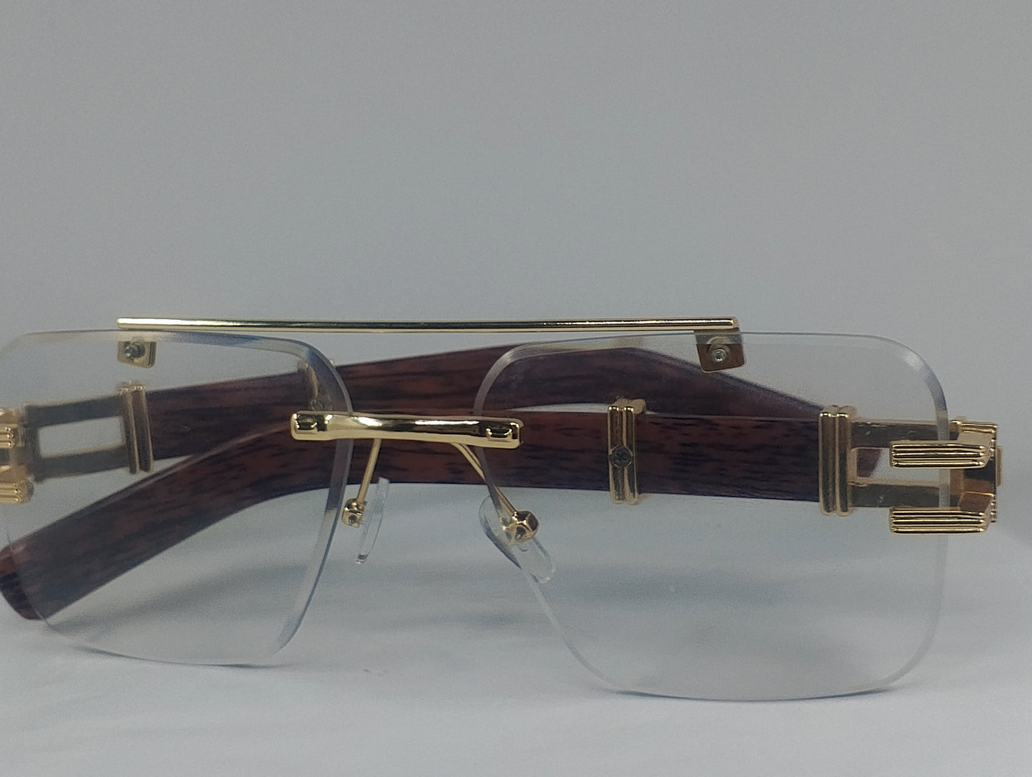 Luxury Rimless Blue-Light Blocking Eyeglasses – Gold Metal Frame with Wood-Grain Temples | Unisex