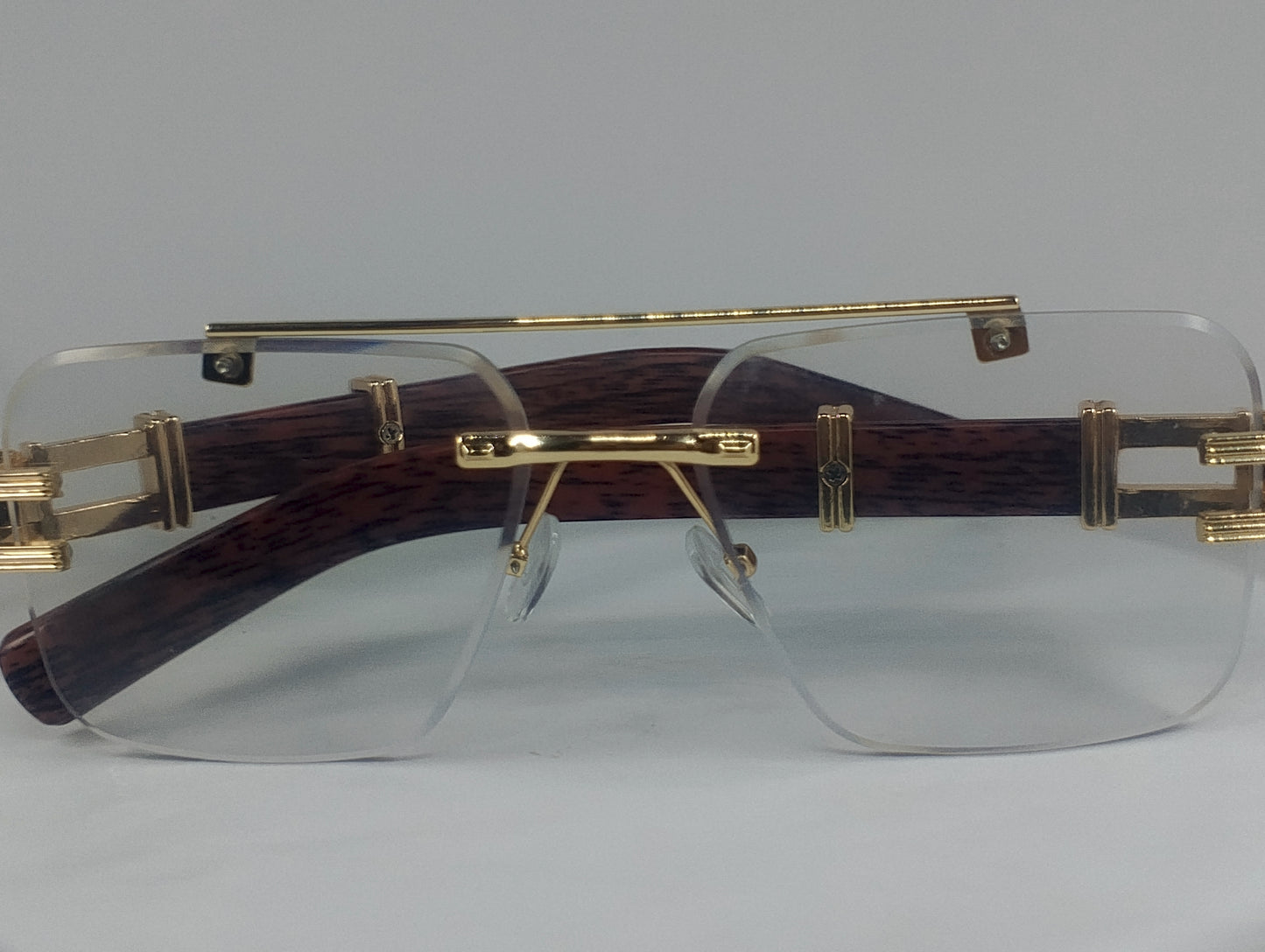 Luxury Rimless Blue-Light Blocking Eyeglasses – Gold Metal Frame with Wood-Grain Temples | Unisex